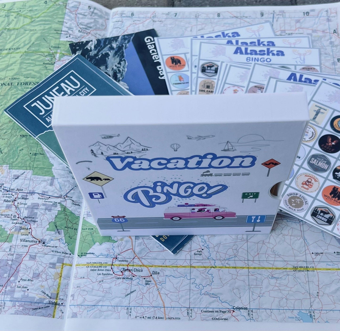 Vacation Bingo Travel Game Alaska edition with hard sided case and 12 unique game cards. Great Summer Family Vacation for Adults and Kids.
