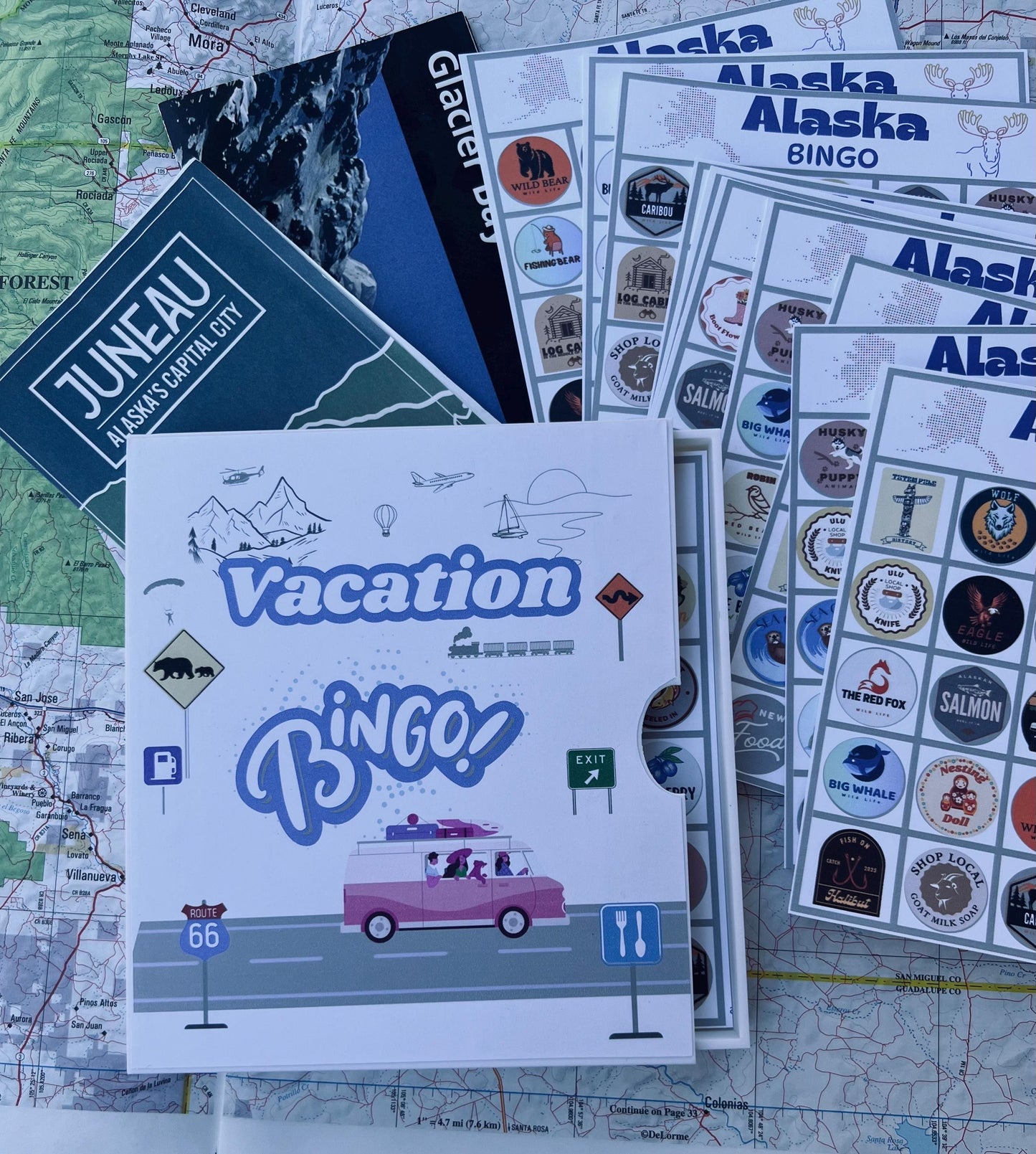 Vacation Bingo Travel Game Alaska edition with hard sided case and 12 unique game cards. Great Summer Family Vacation for Adults and Kids.